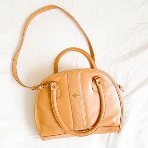 Ponte Vintage Handbag with Crossbody Strap 

• Tan 
• Crossbody Strap 
• Vintage